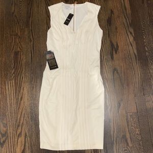 Faux boning ivory Bebe dress.